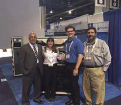 Team Inovaxe with the NPI award-winning InoAuto SMART Mix cart